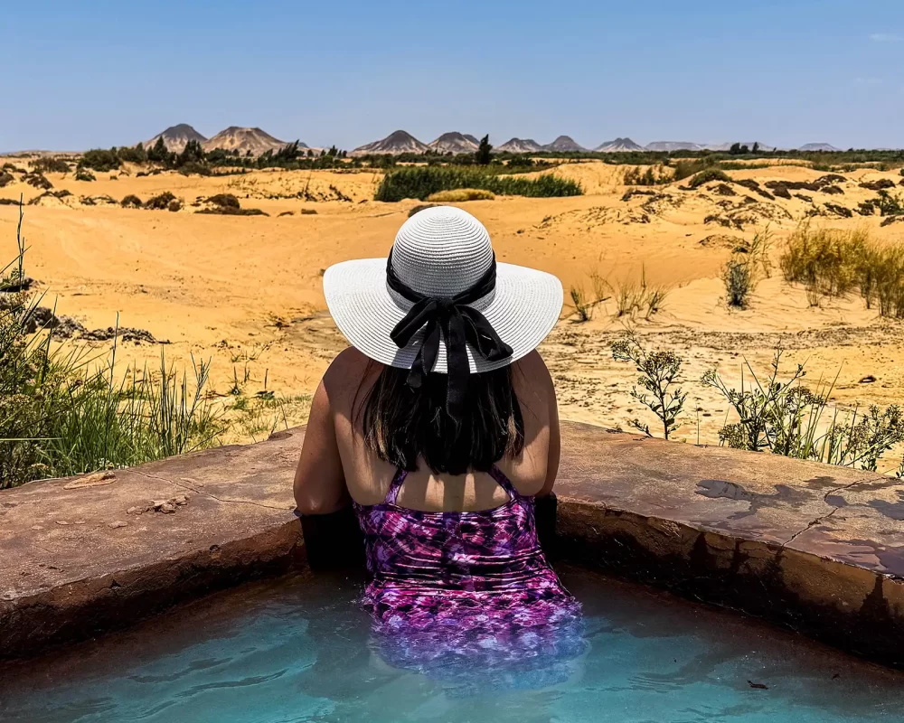 Christina Wagar relaxes in a geothermal spring in Egypts Western Desert