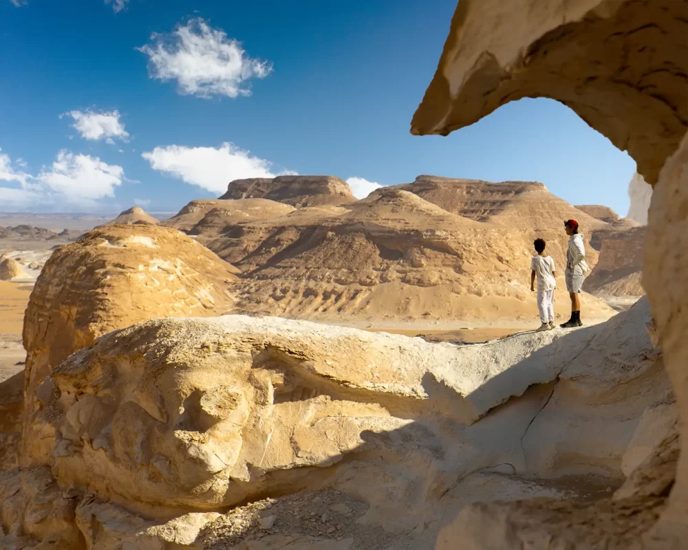 Two boys hiking in Egypt's Western Desert